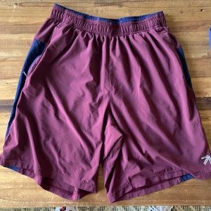 Lightly used New Balance running shorts with liner